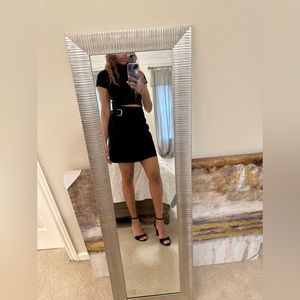 Black leather skirt with gold buckle